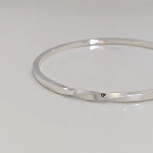 handmade polished twisted bangle