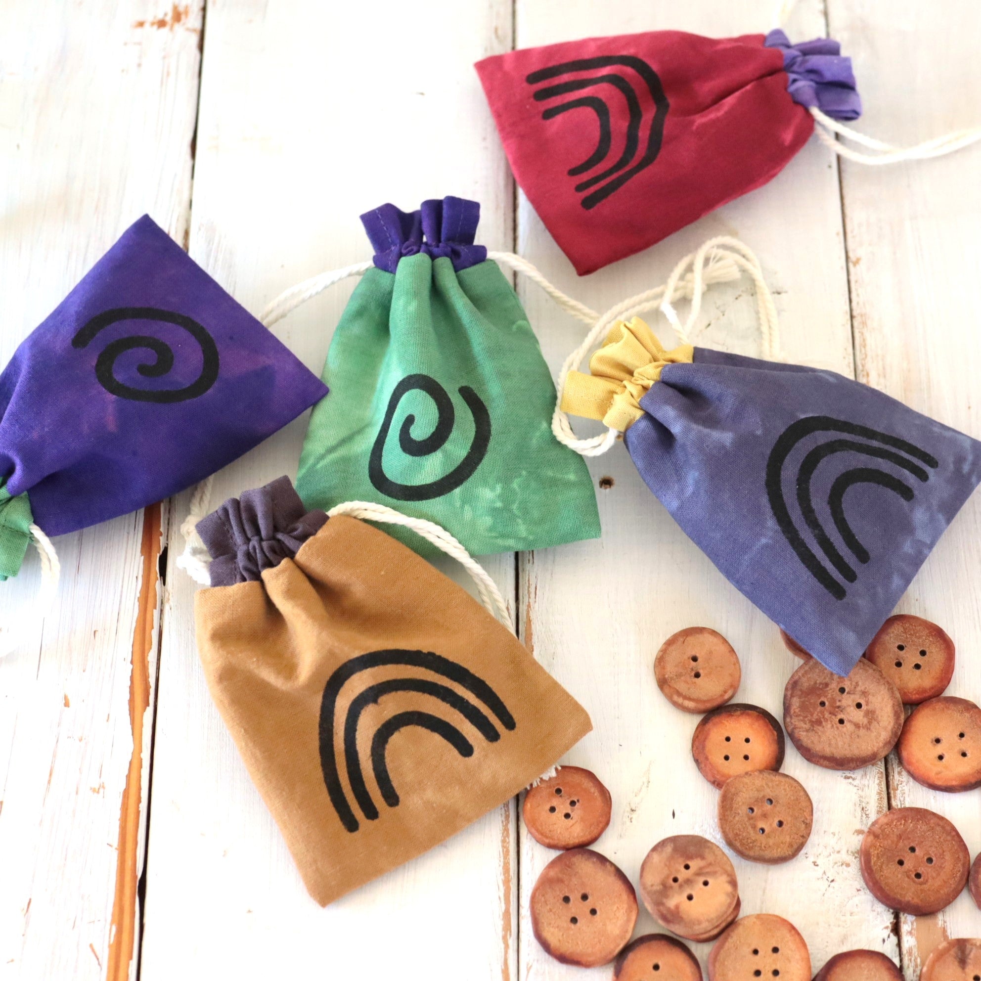 Hand carved Avocado pit Buttons, set of 10 with hand dyed pouch.