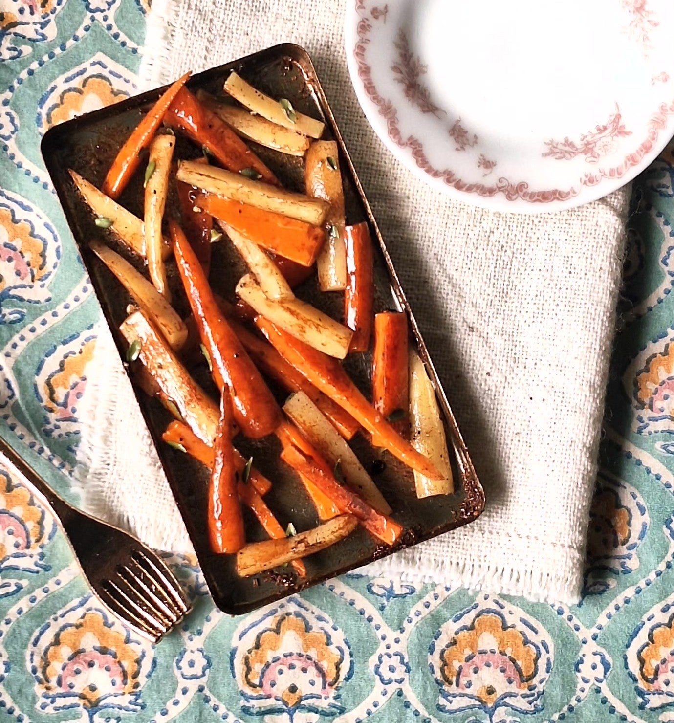 Honey roasted Carrot and Parsnips (with metal serving spoon)