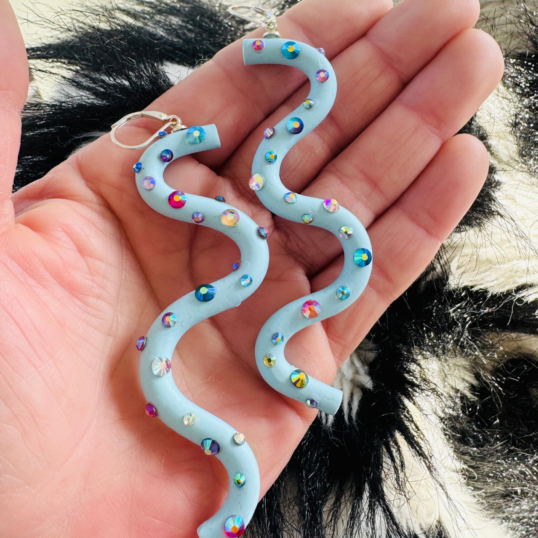 Pastel blue squiggle polymer clay earrings with holographic gems