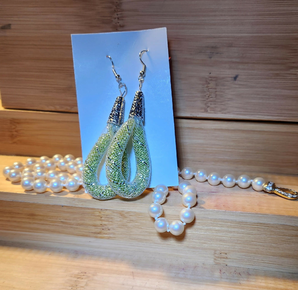white nylon mesh, green bead, dangle hoop earrings.