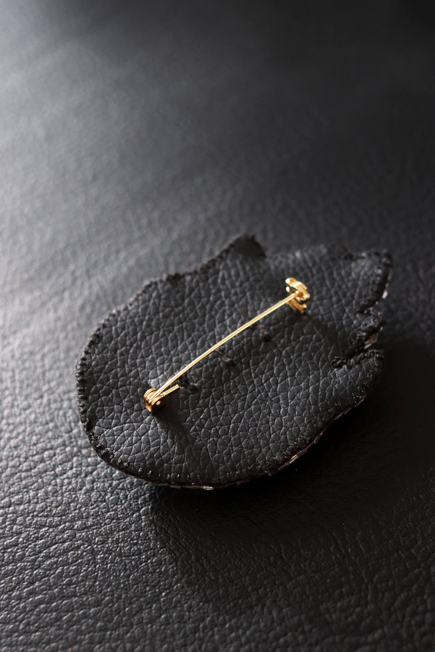 Beaded Fire Eye Brooch