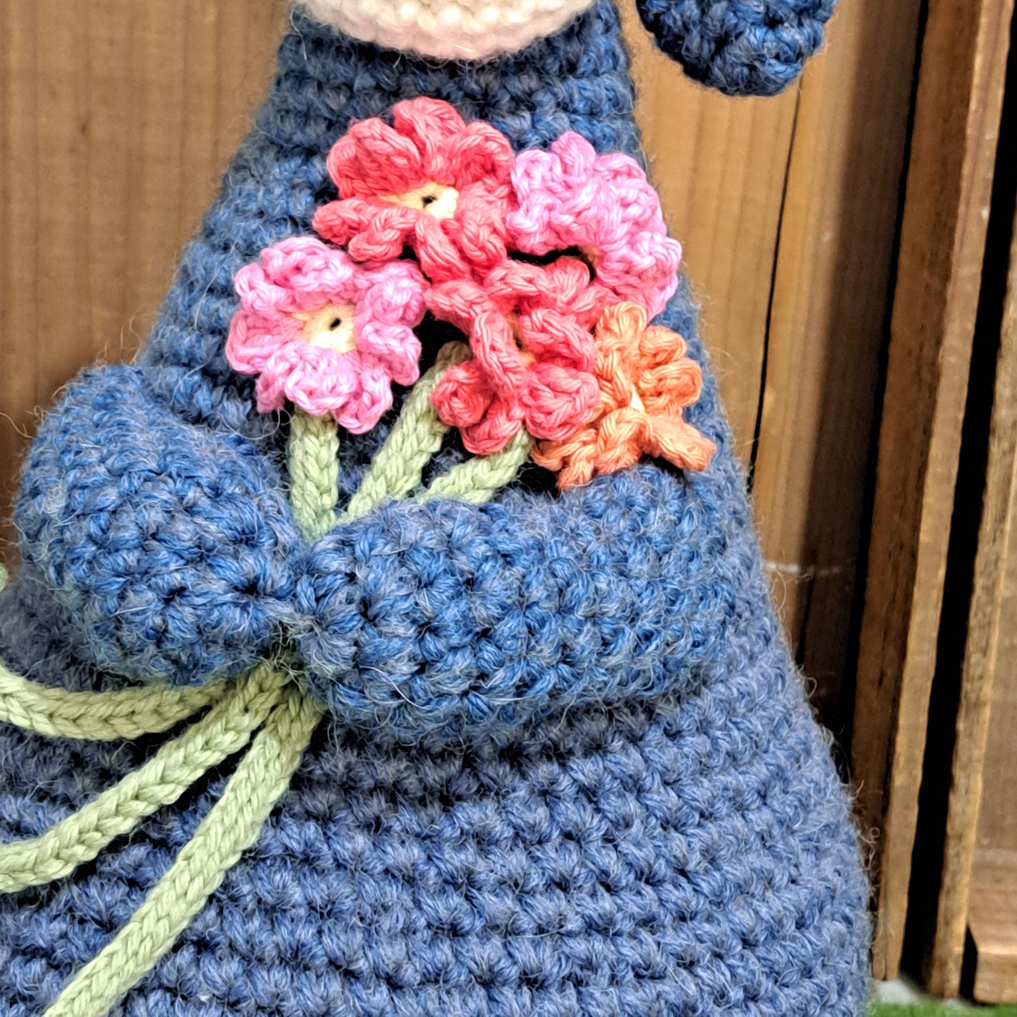 Handmade Highland cow crochet character doorstop in blue