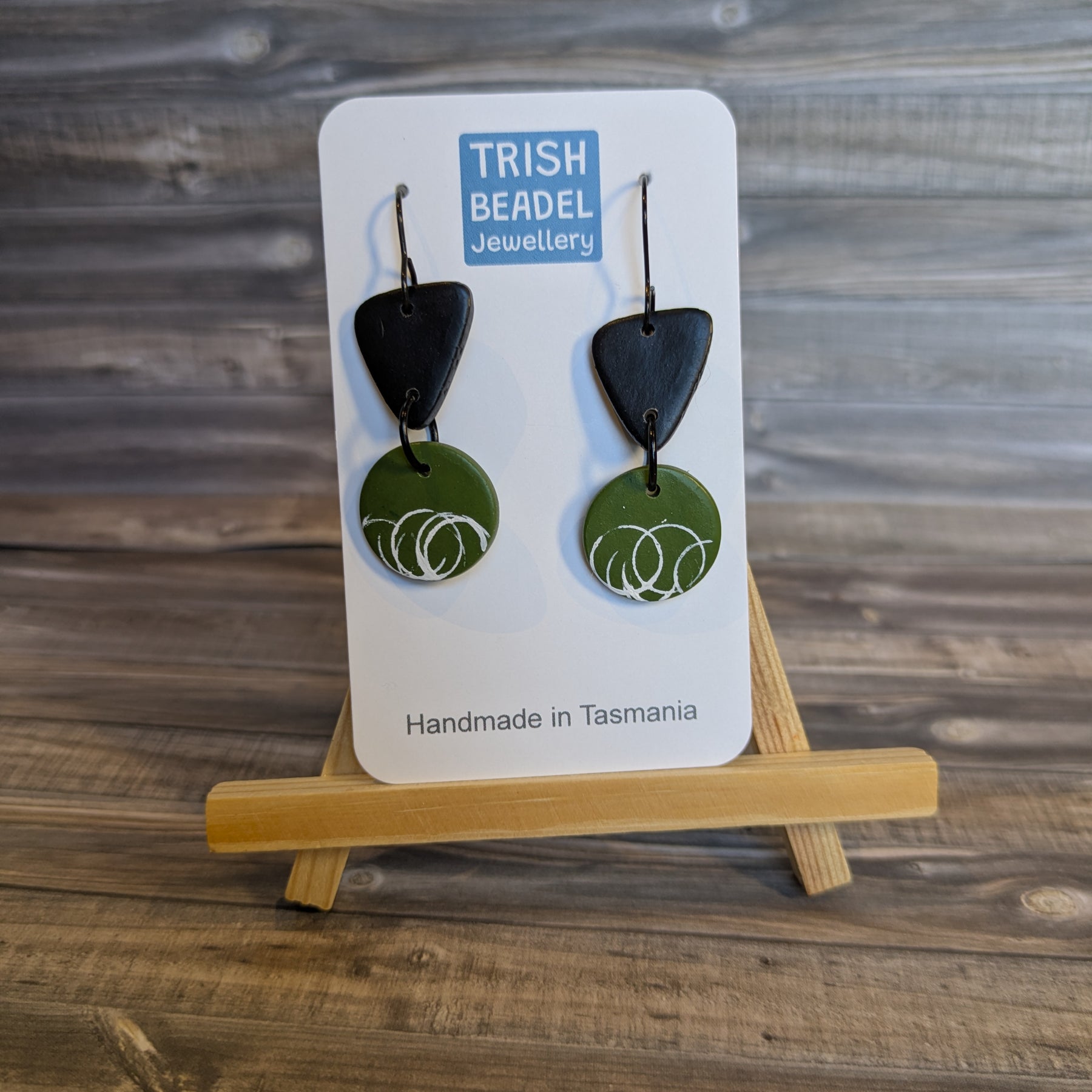 Green circle drop earrings