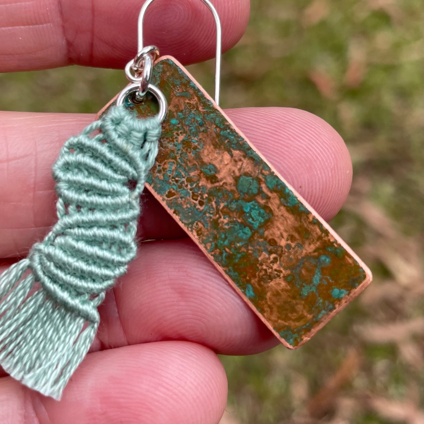 Sage green macrame thread on patinated copper