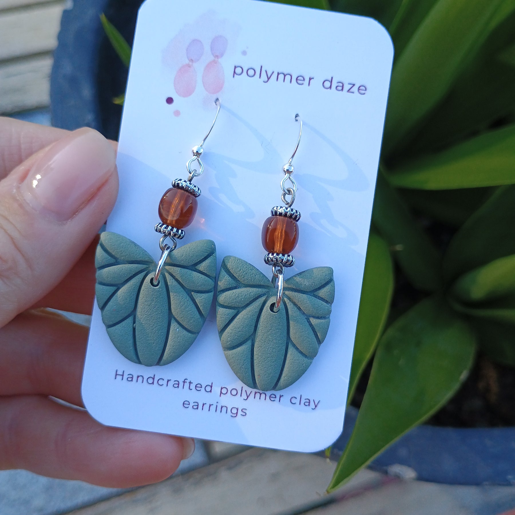 Beaded leaf dangle earrings