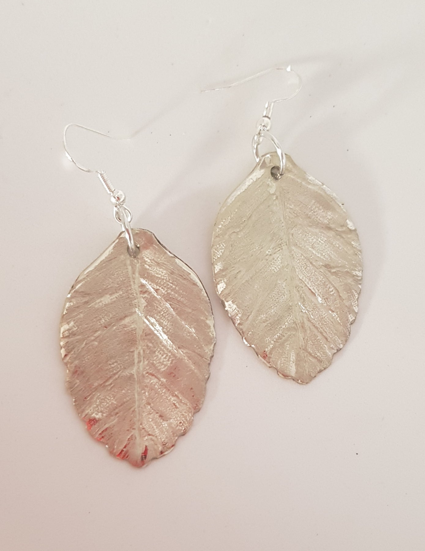 Small round leaf silver earrings #697AM/E