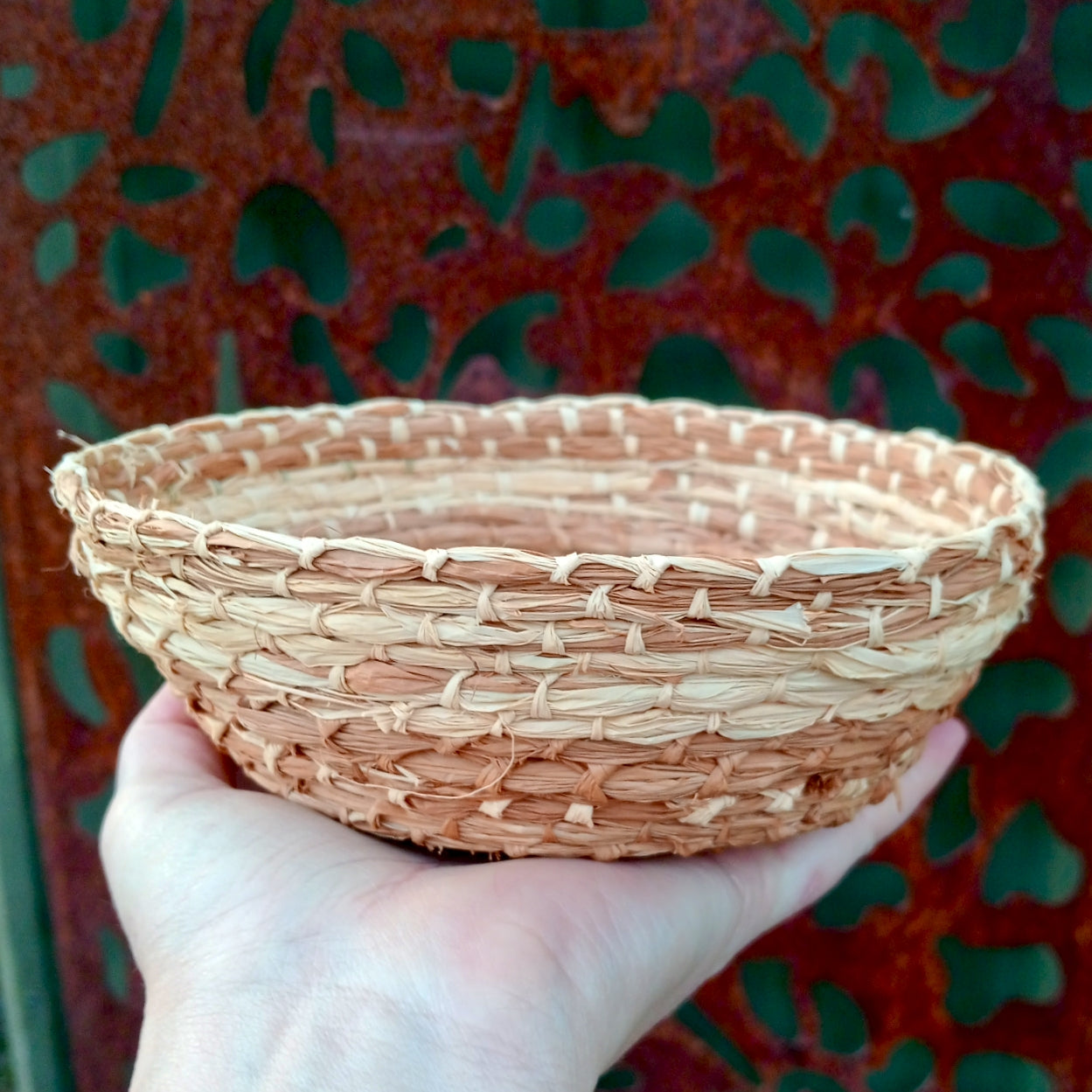 Woven hand dyed raffia basket