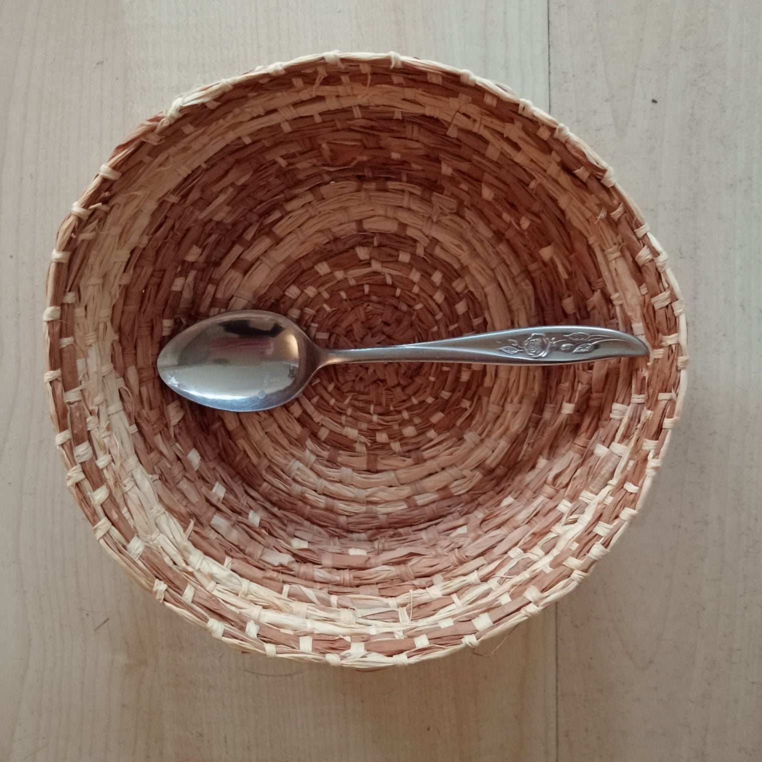 Woven hand dyed raffia basket