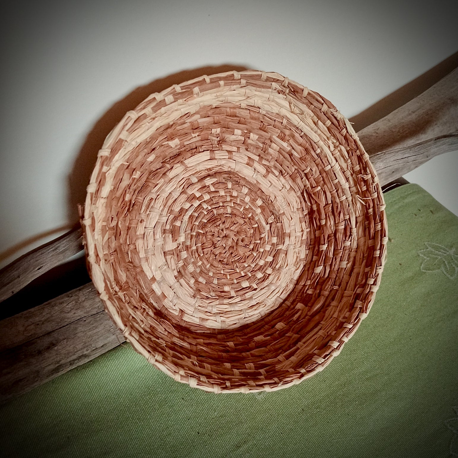 Woven hand dyed raffia basket