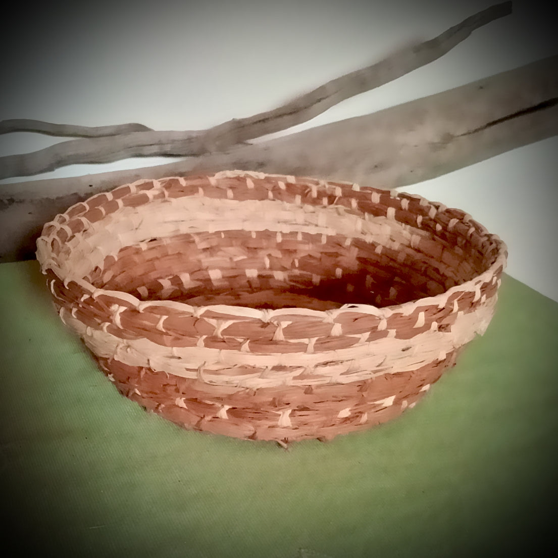 Woven hand dyed raffia basket