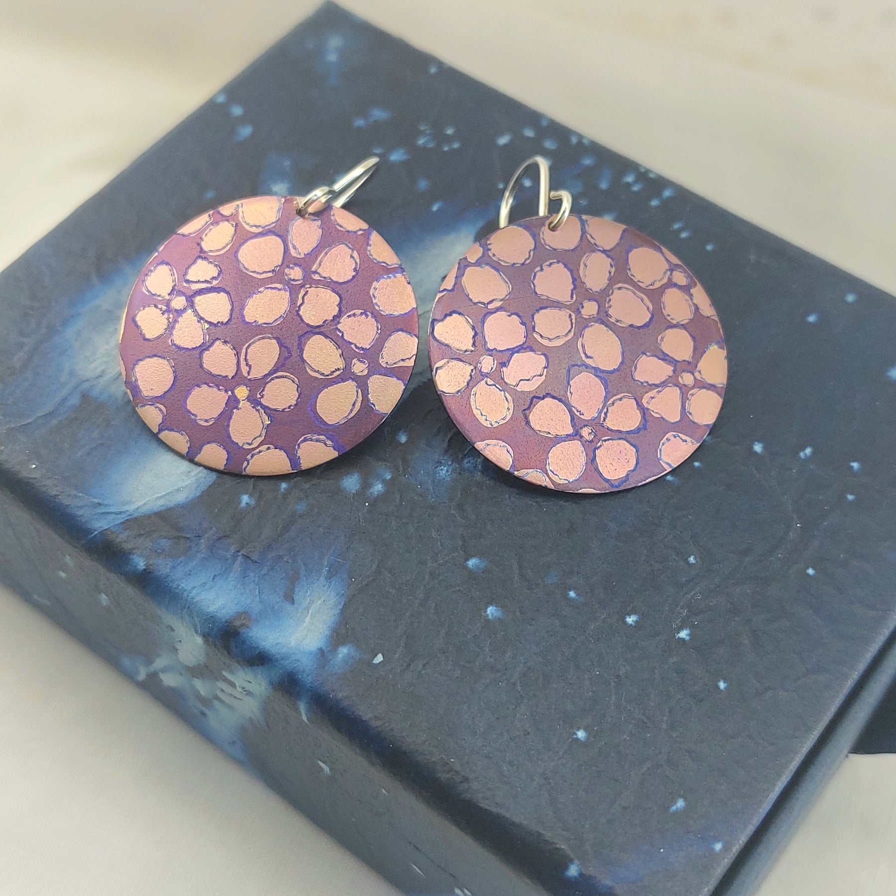 Titanium Disc Earrings with Leptospermum Design- purple, pink, blue
