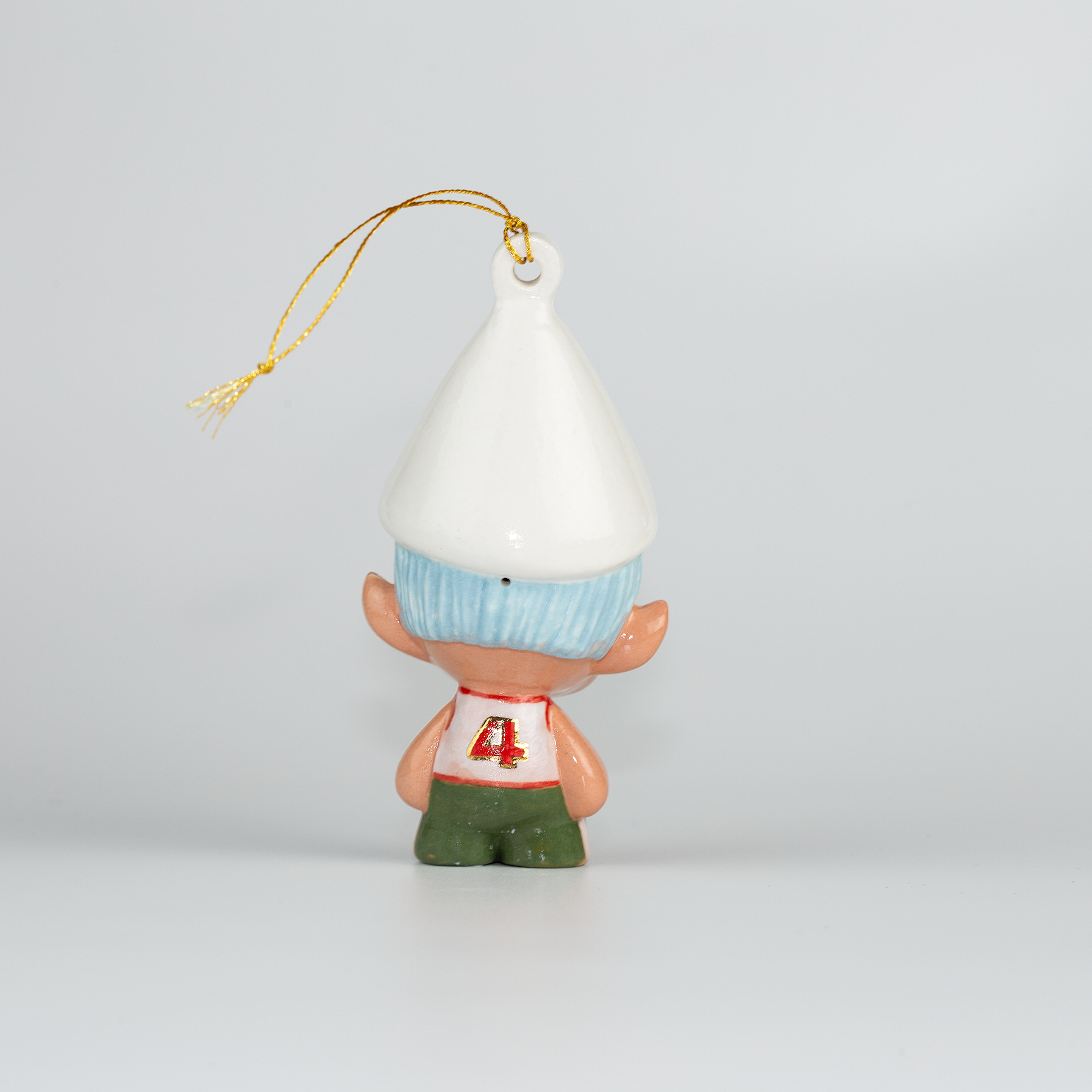 Handmade Porcelain Christmas ornament. One-of-a-kind. Kade the footy Elf.