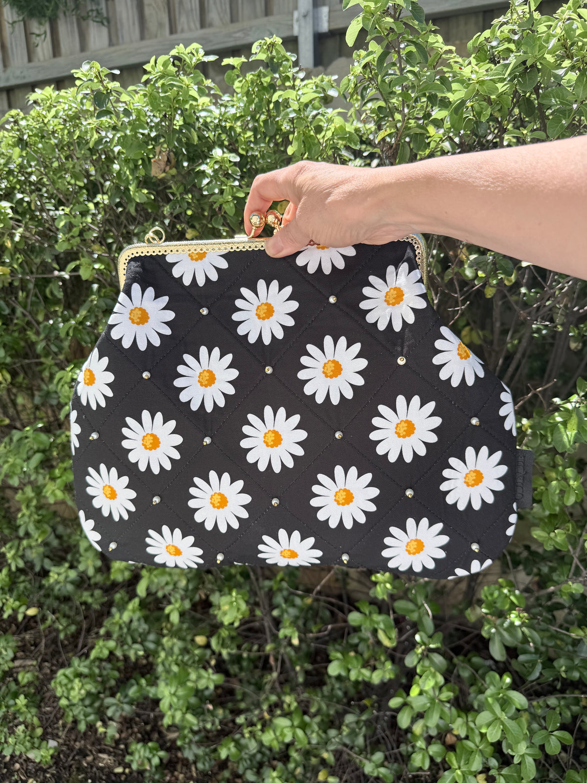 ‘Field of daisies’ metal frame purse