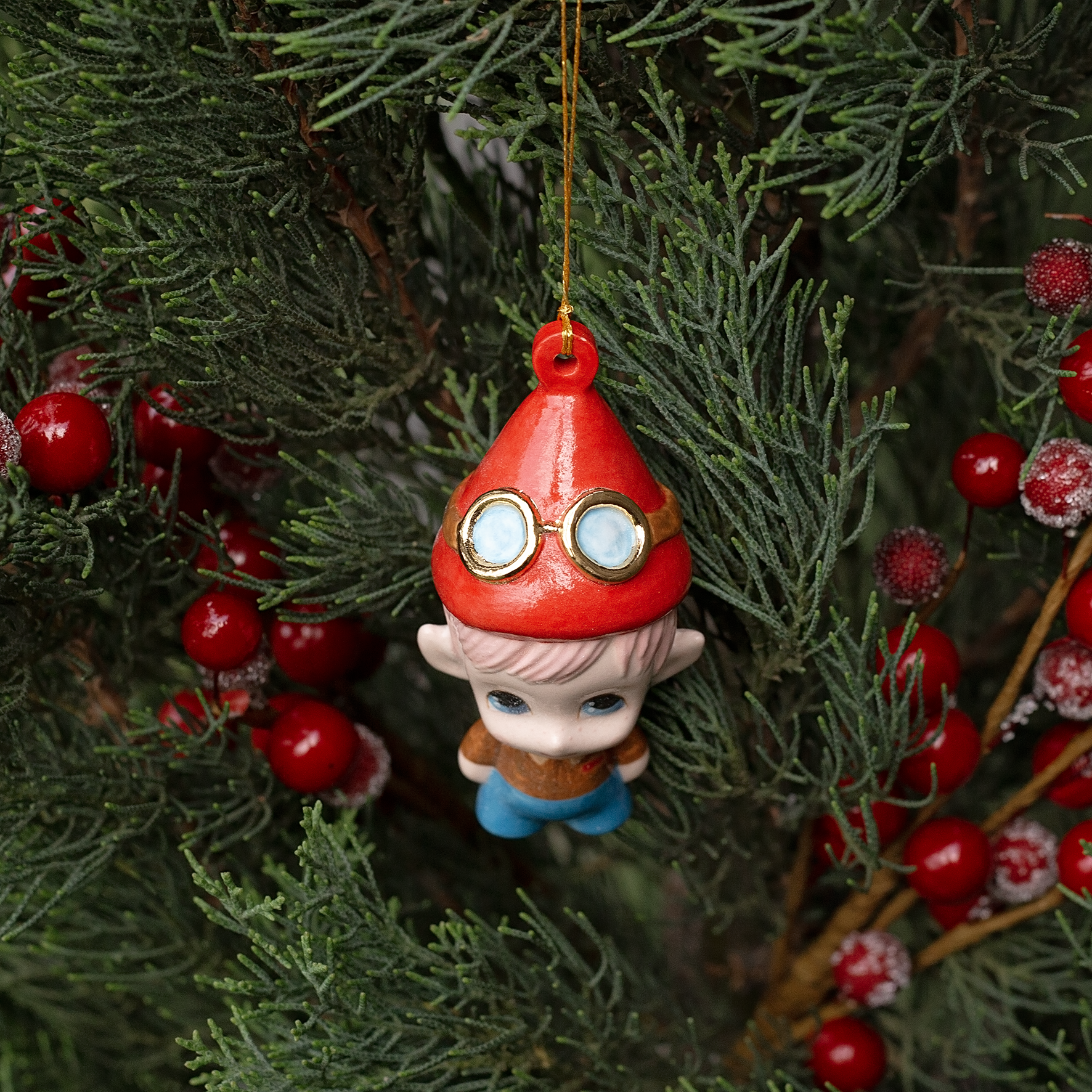 Handmade Porcelain Christmas ornament. One-of-a-kind. Malakai the Pilot Elf.