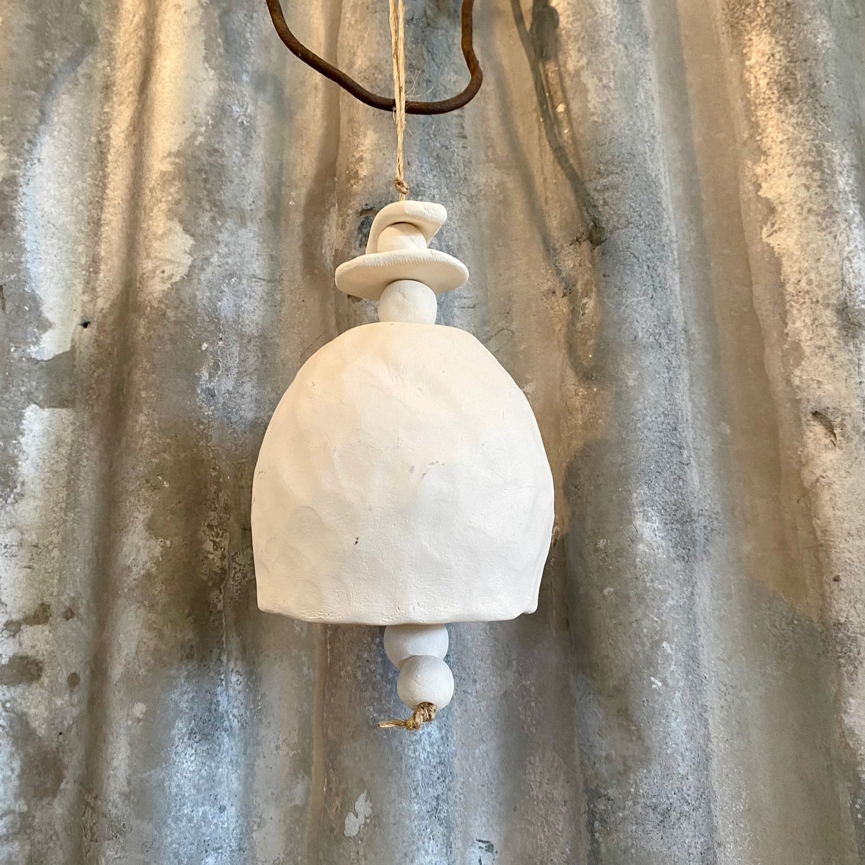 Handmade White Clay Bell on jute string (26-14)