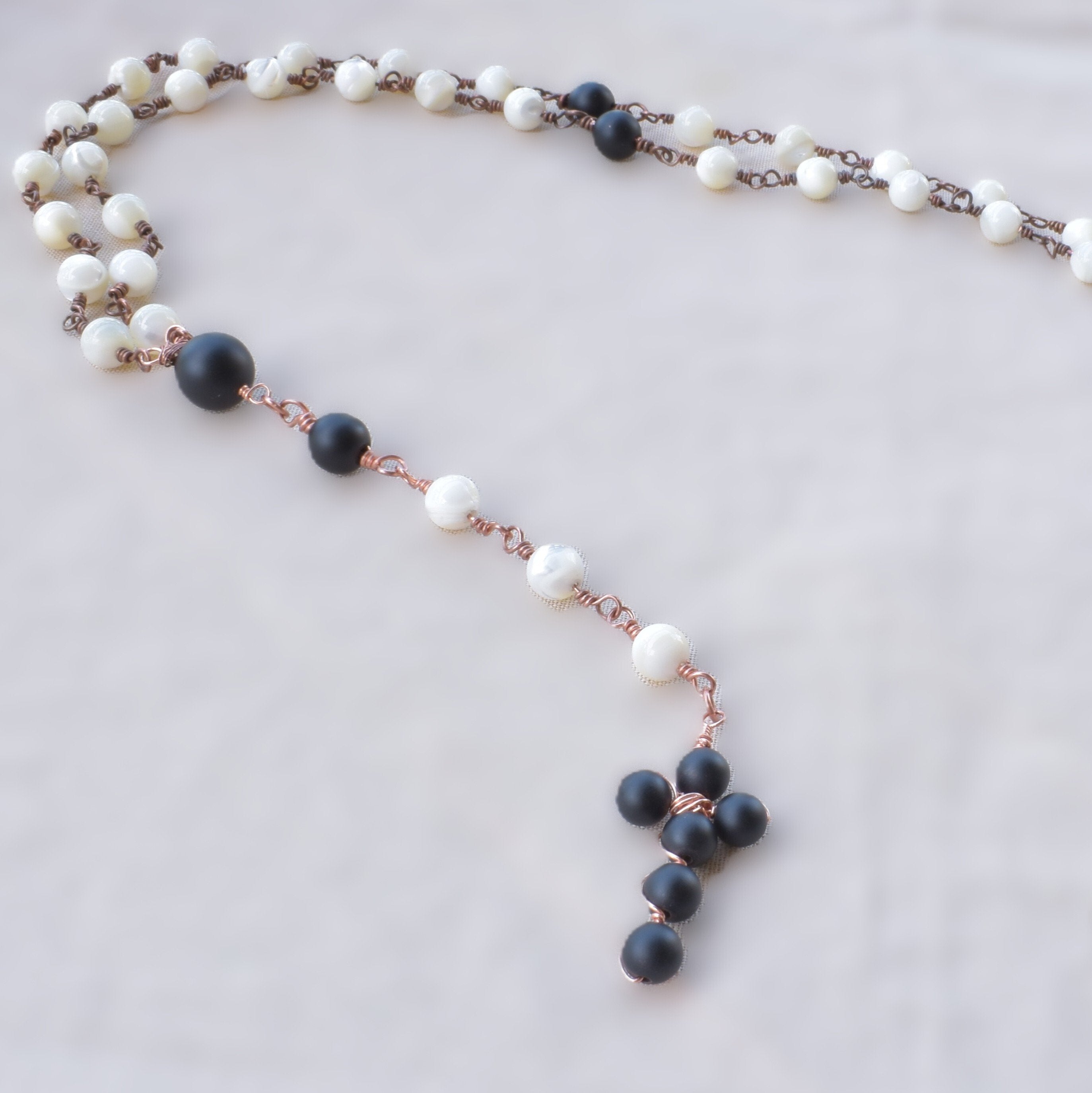 Stillness — Handcrafted Rosary in Mother of Pearl & Onyx