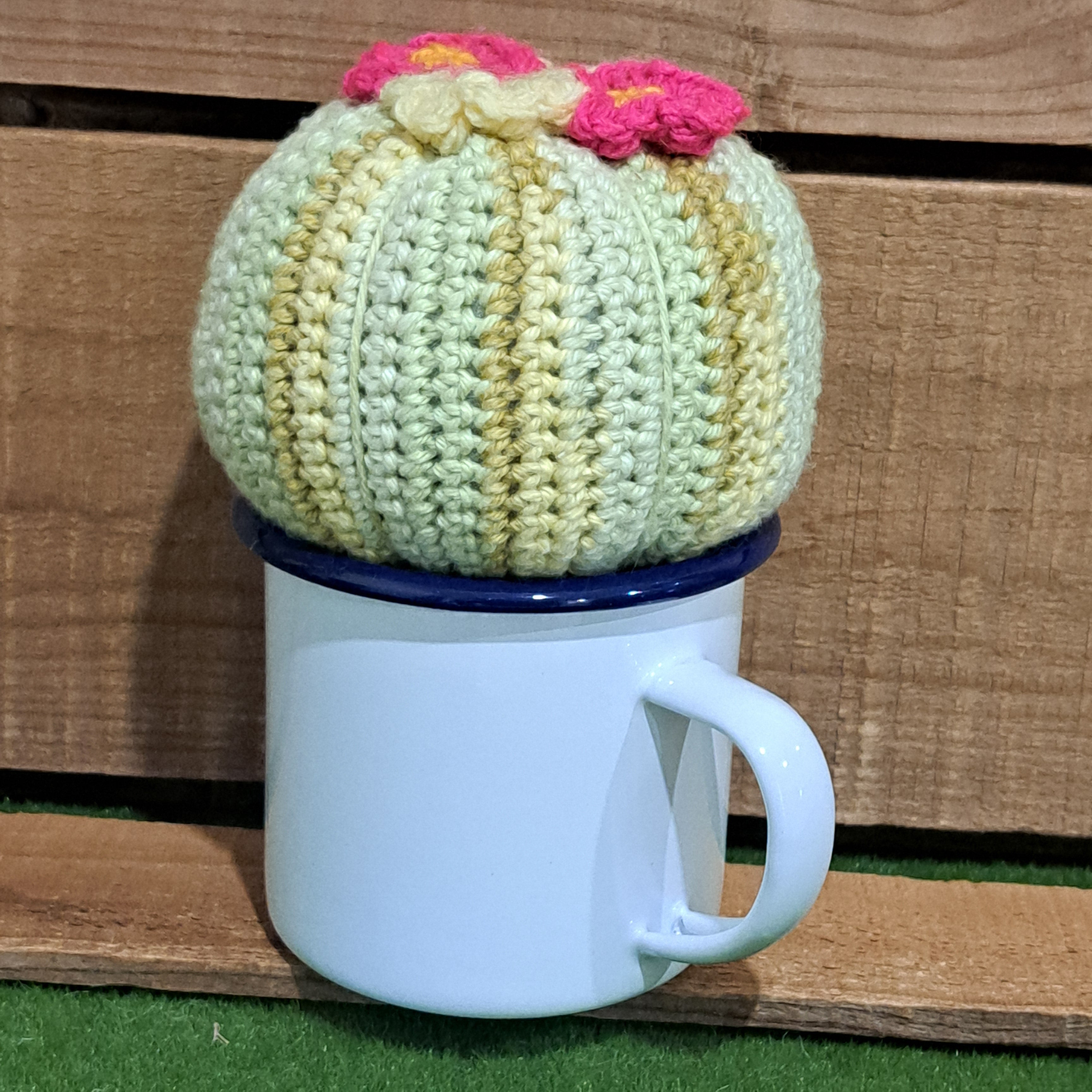 Crochet cactus/in a tin mug/ crochet pink and yellow flowers.