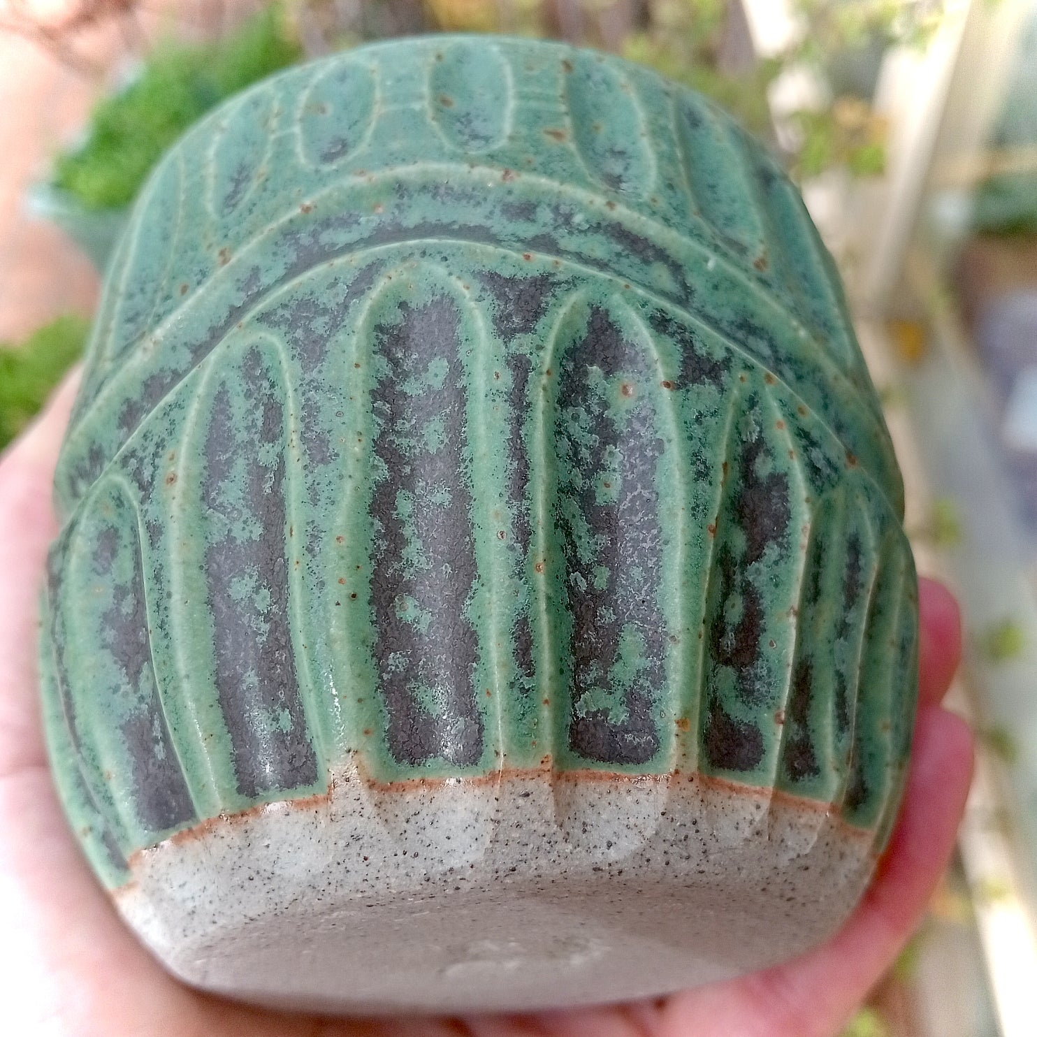 Rustic green and black coffee tumbler with rusty coloured flecks