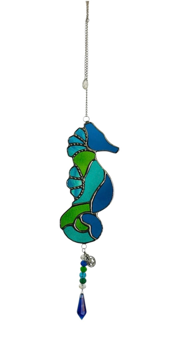Stained glass seahorse in blue and green