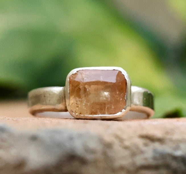 Emerald cut orange topaz in 925 silver