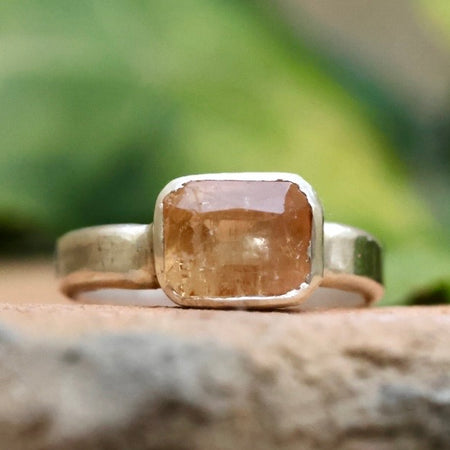 Emerald cut orange topaz in 925 silver