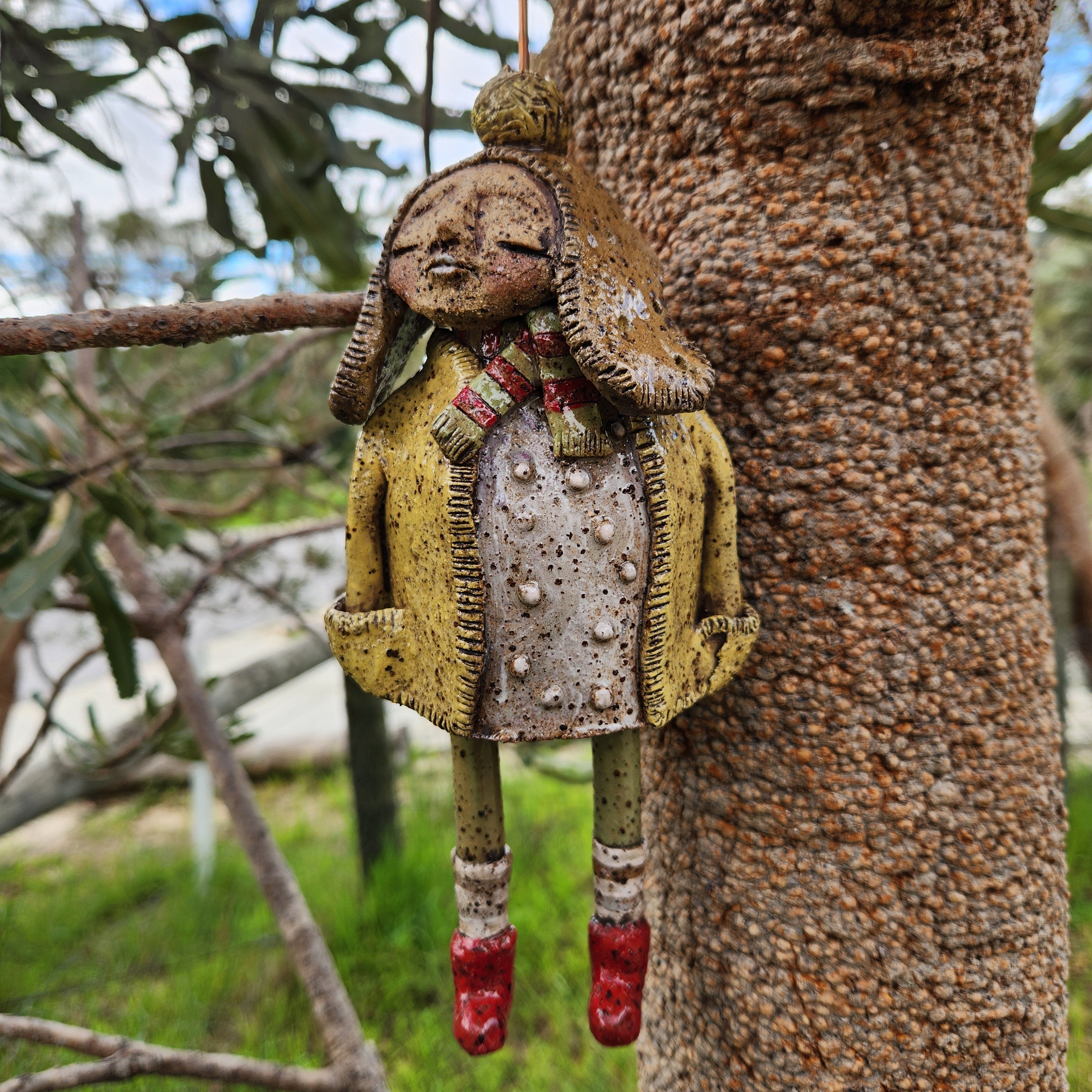 Handmade clay windchime, little girl