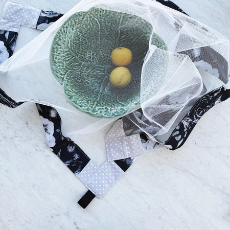 Black roses weighted mesh food cover.