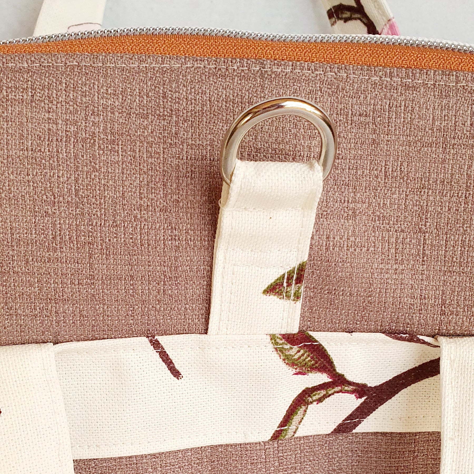 Magnolia Blossom modern bag converting from handbag into crossbody or backpack