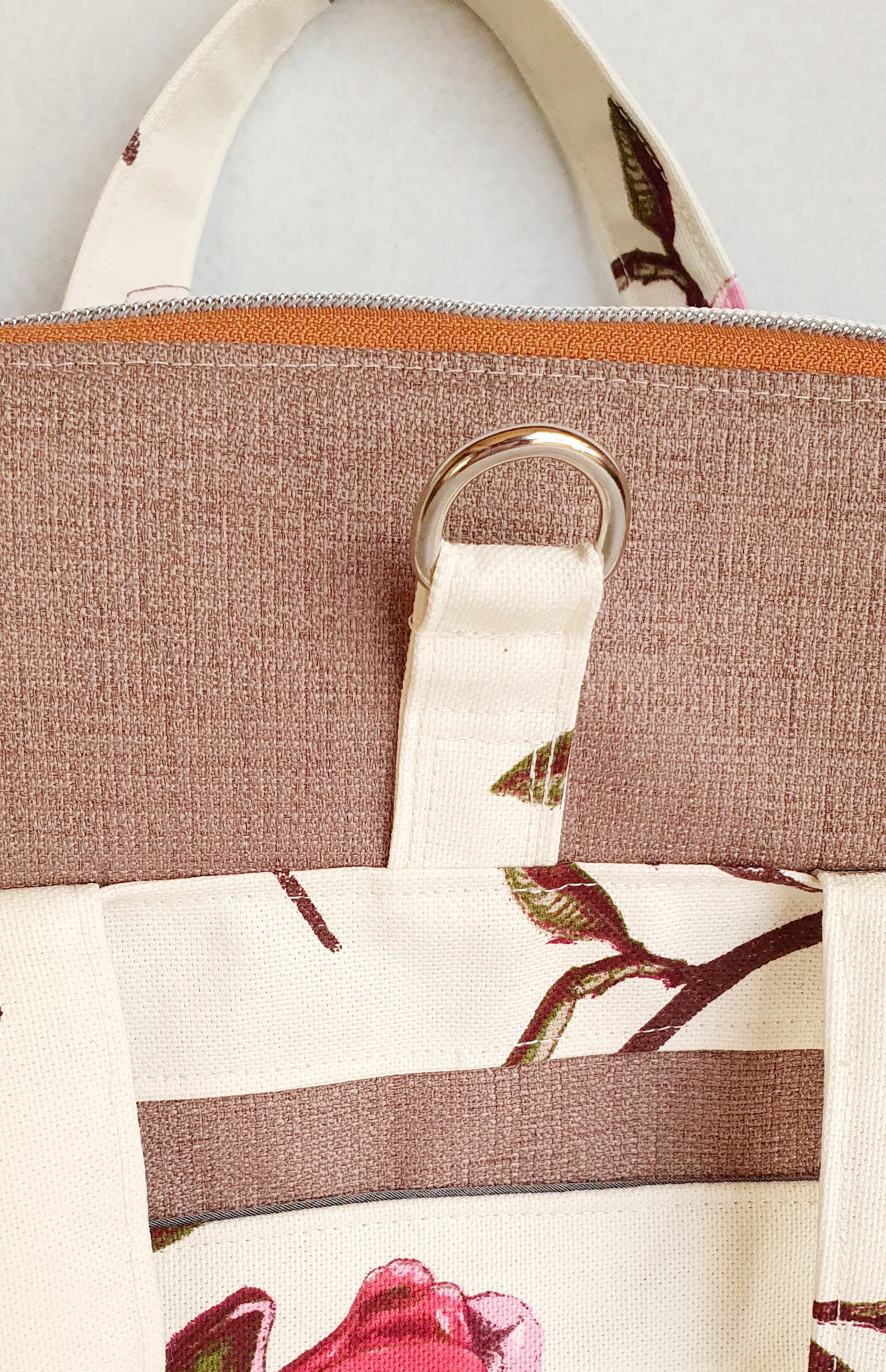 Magnolia Blossom modern bag converting from handbag into crossbody or backpack
