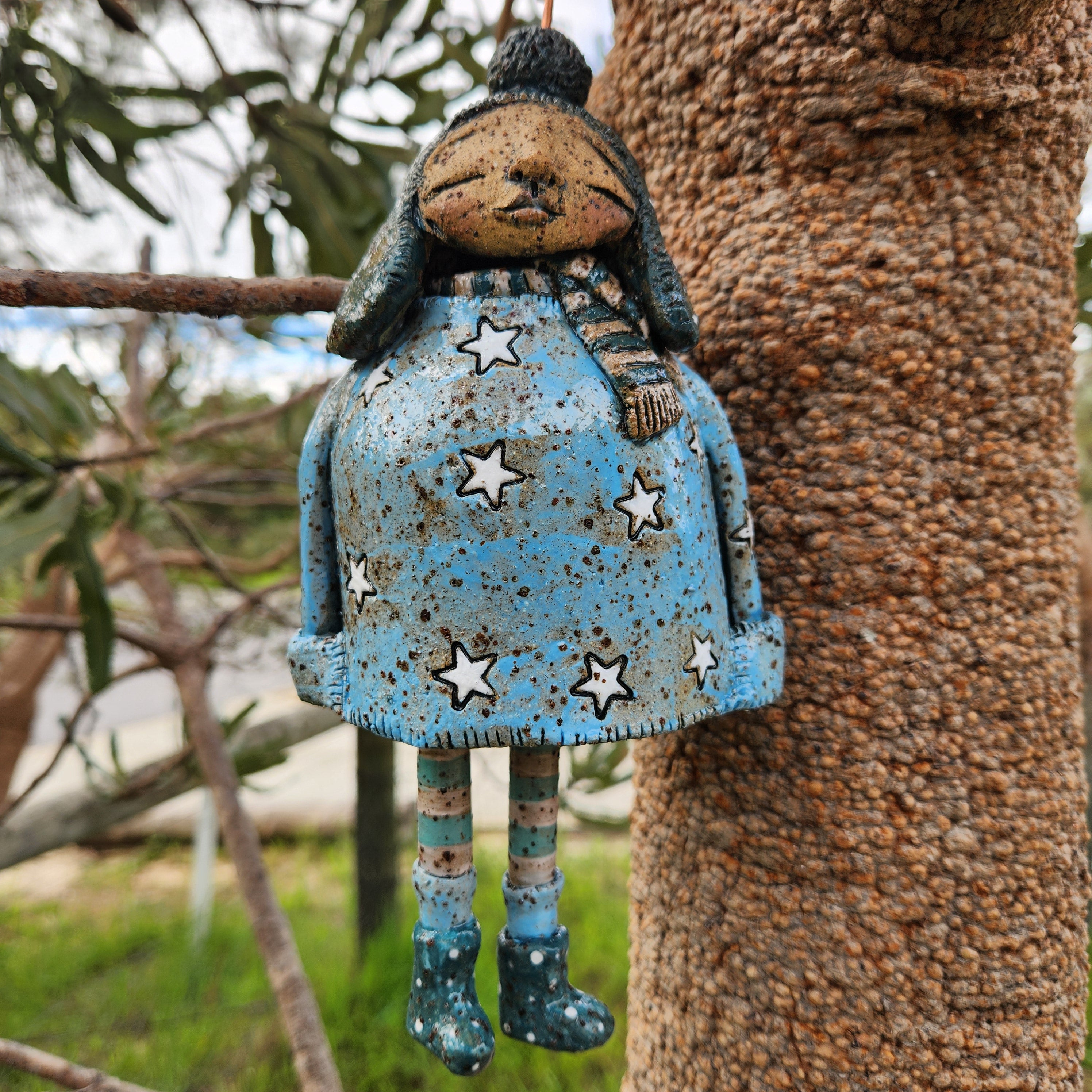 Clay windchime, little girl, stars, spots