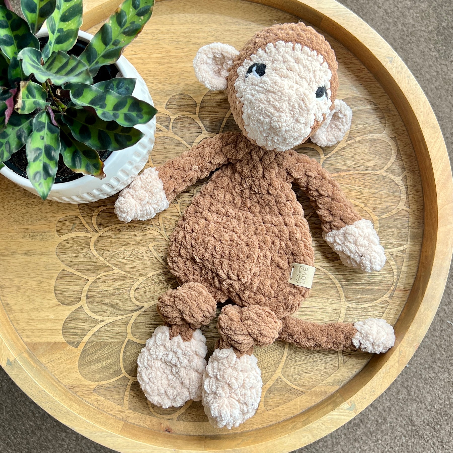 Handmade modern crochet toy monkey lovey snuggler.