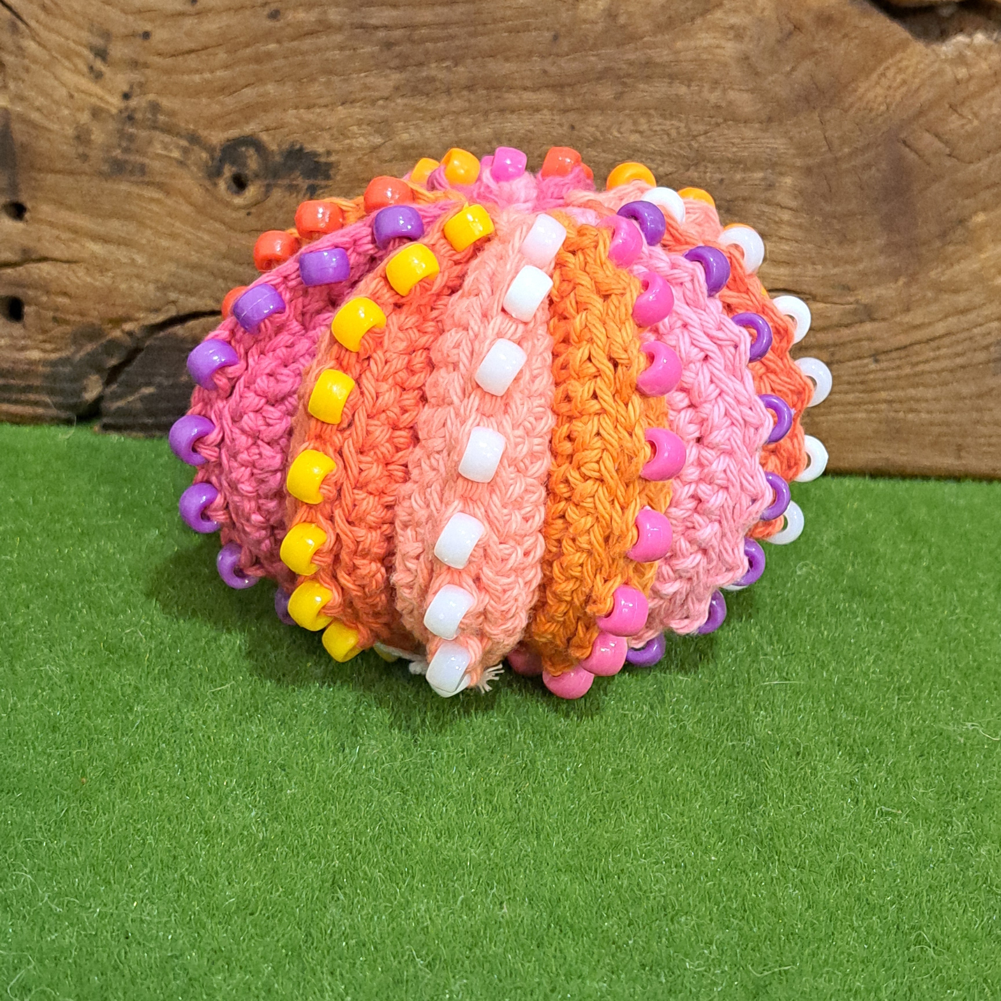 Crochet fidget stress ball/beaded/pinks and oranges