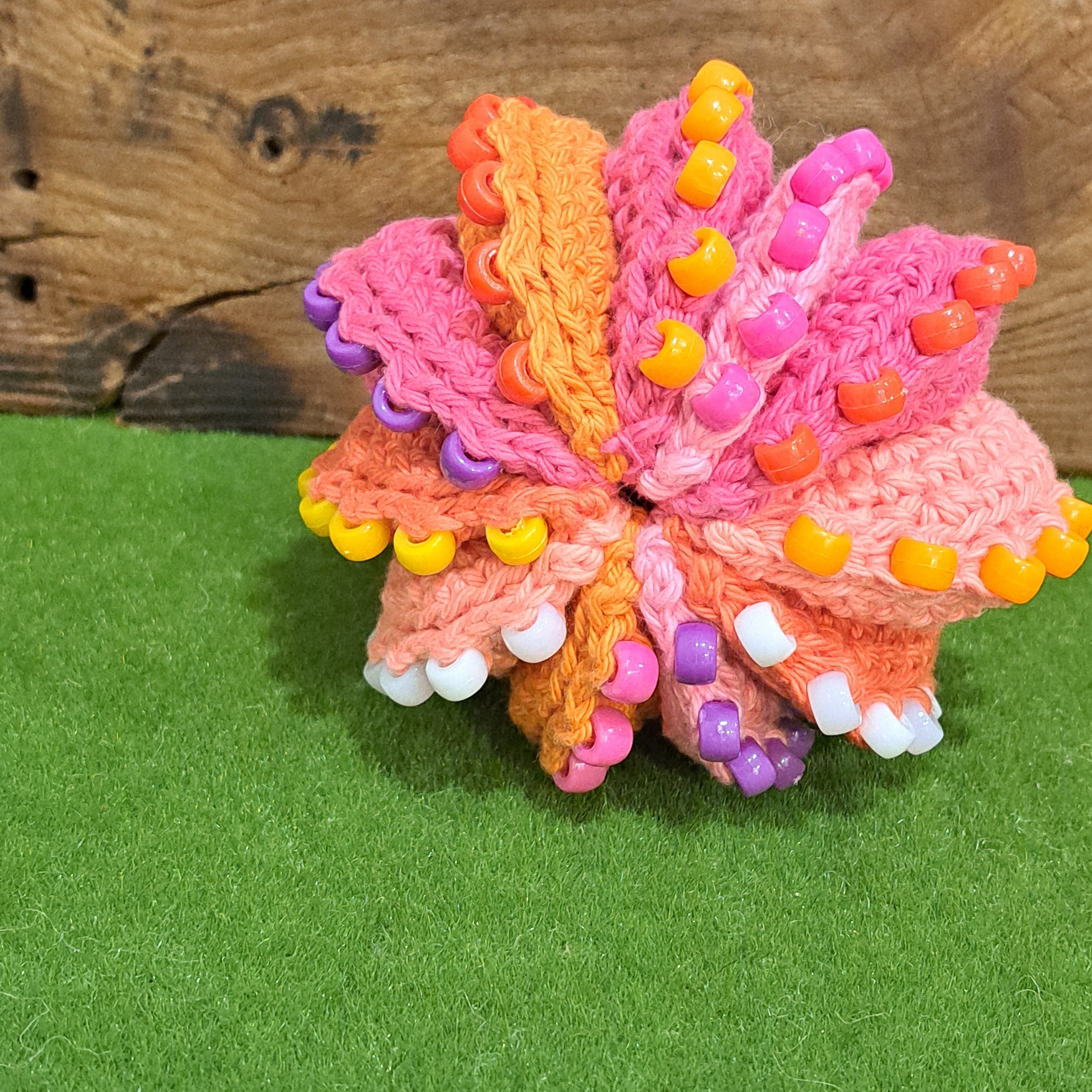 Crochet fidget stress ball/beaded/pinks and oranges