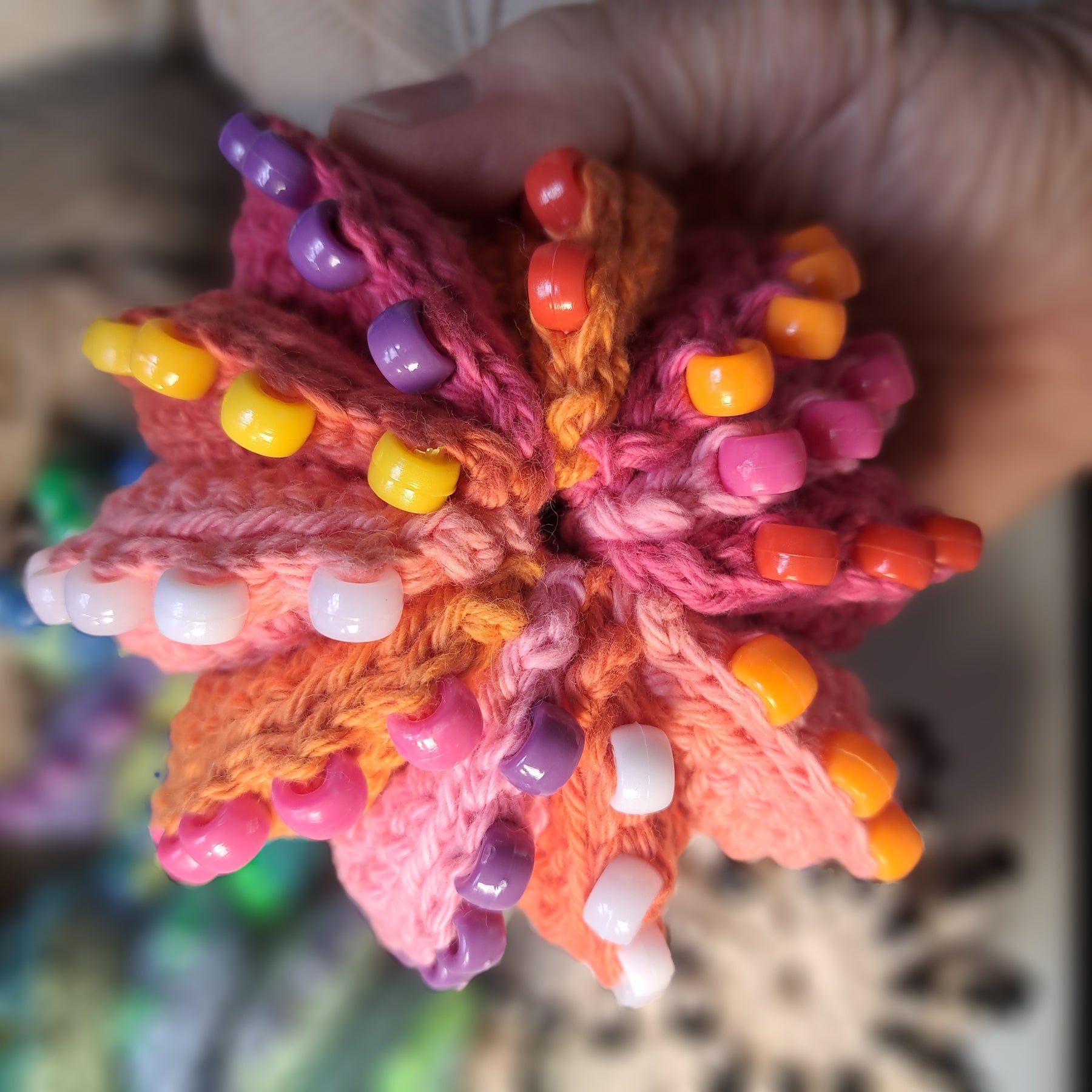 Crochet fidget stress ball/beaded/pinks and oranges