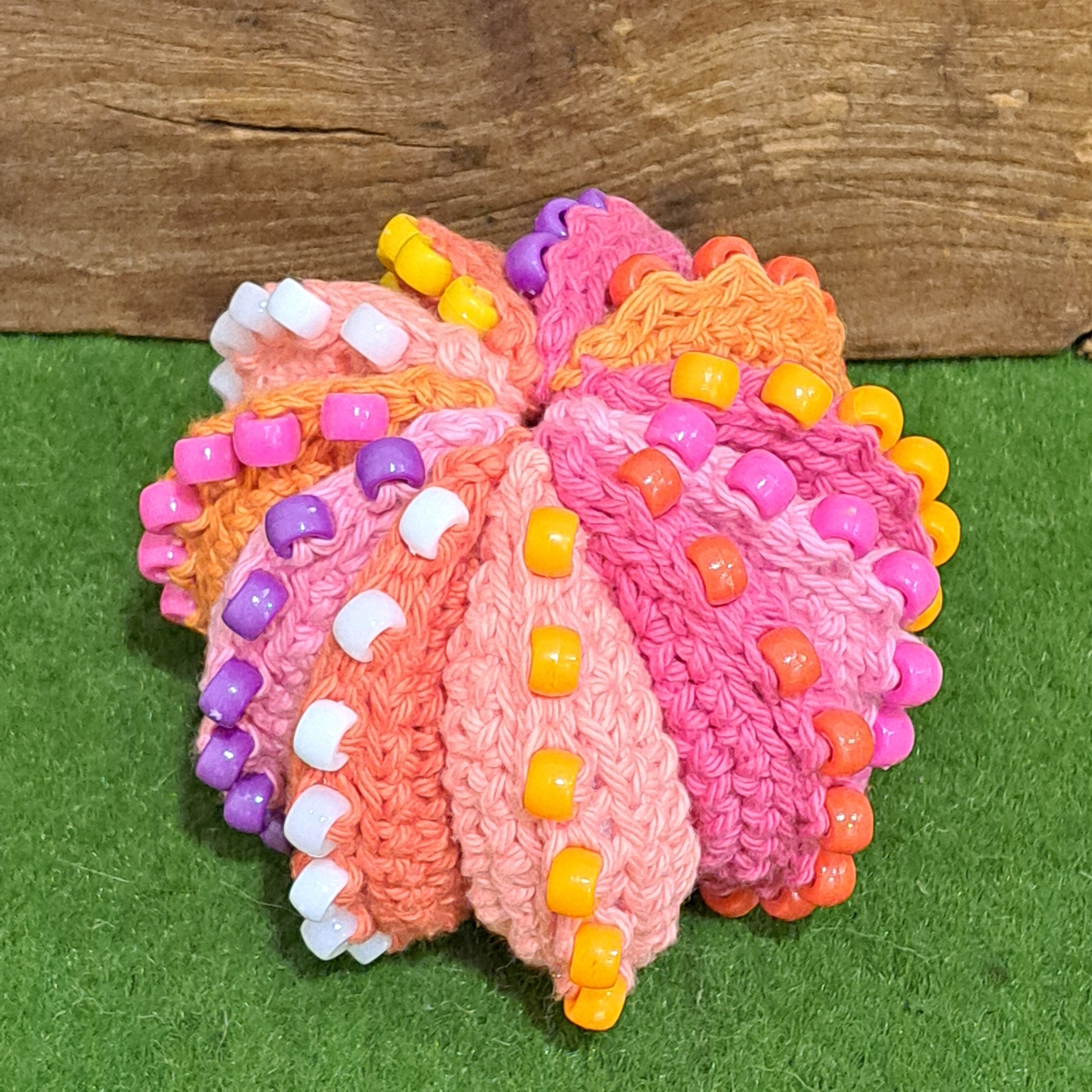 Crochet fidget stress ball/beaded/pinks and oranges