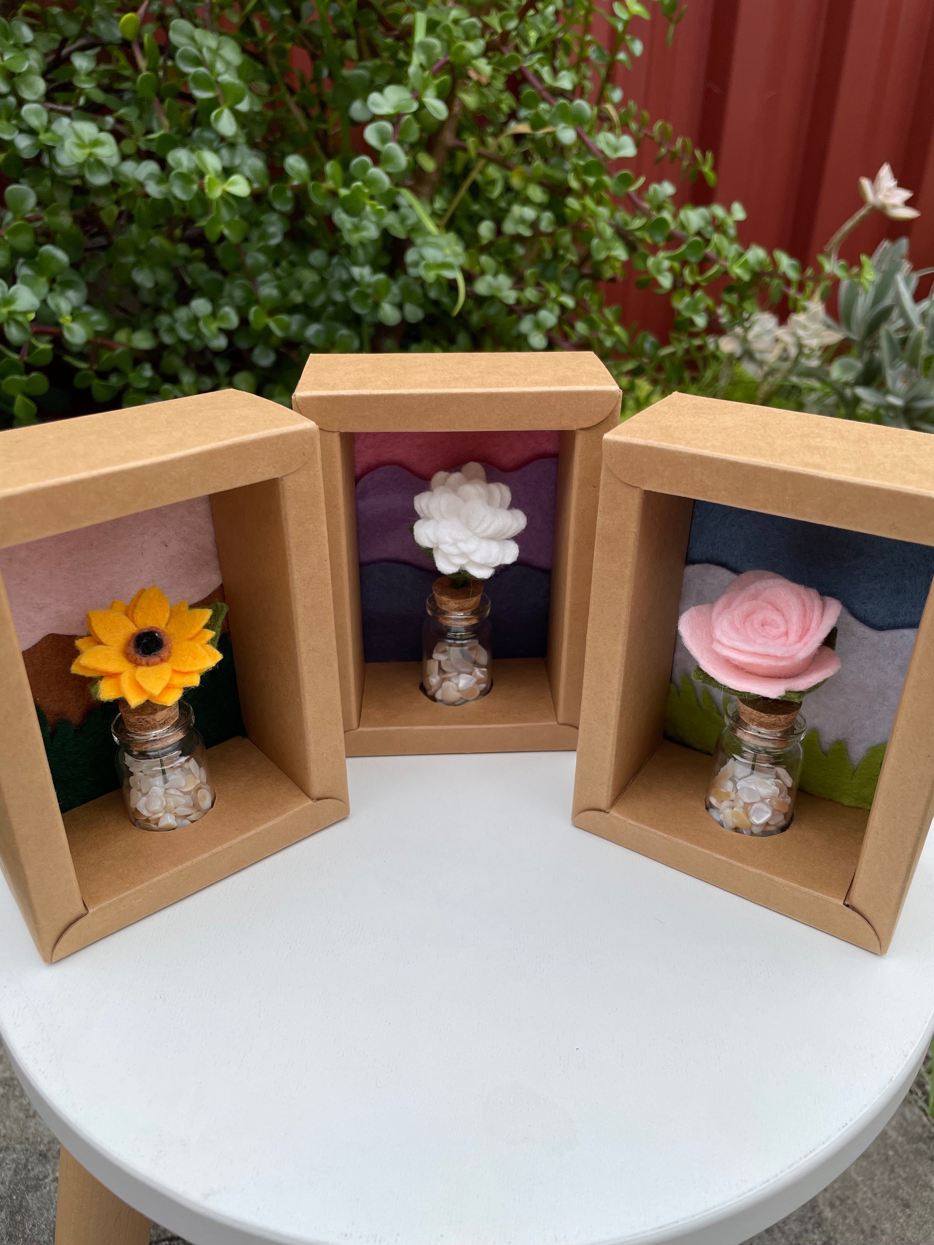 Minature flower in glass jar