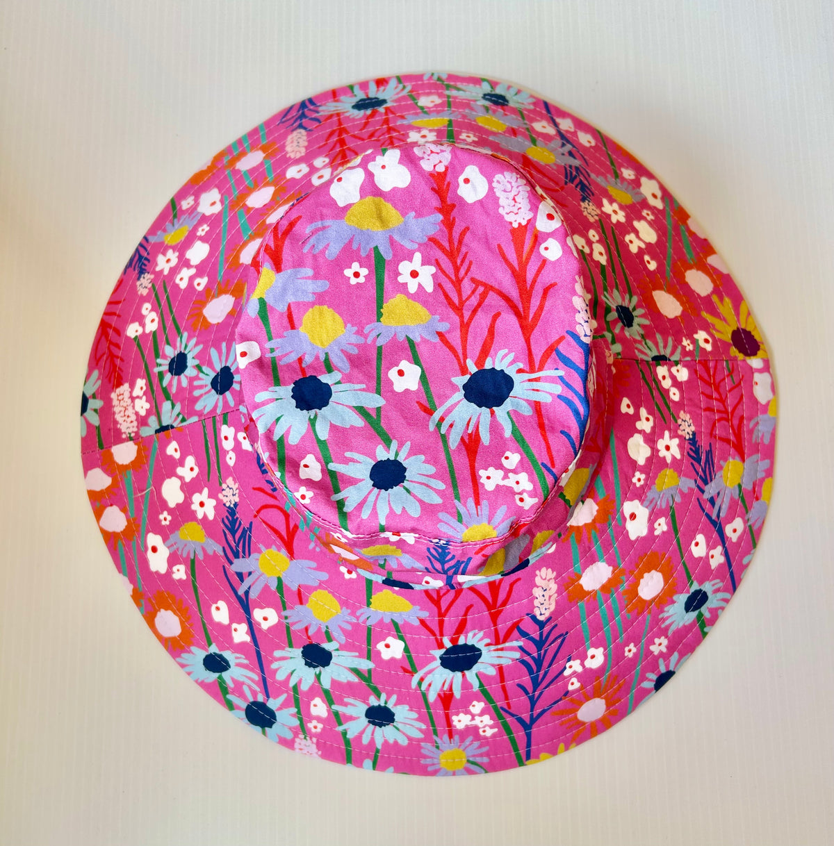 Summer hat in bright floral fabric