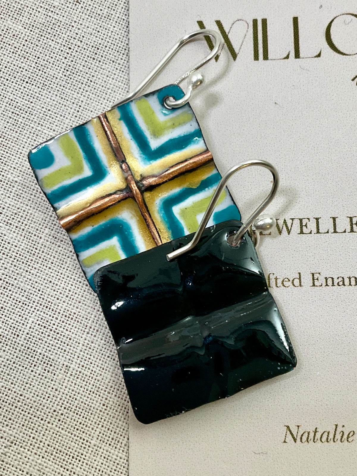 White, gold, teal and green fold form enamel earrings. Handmade