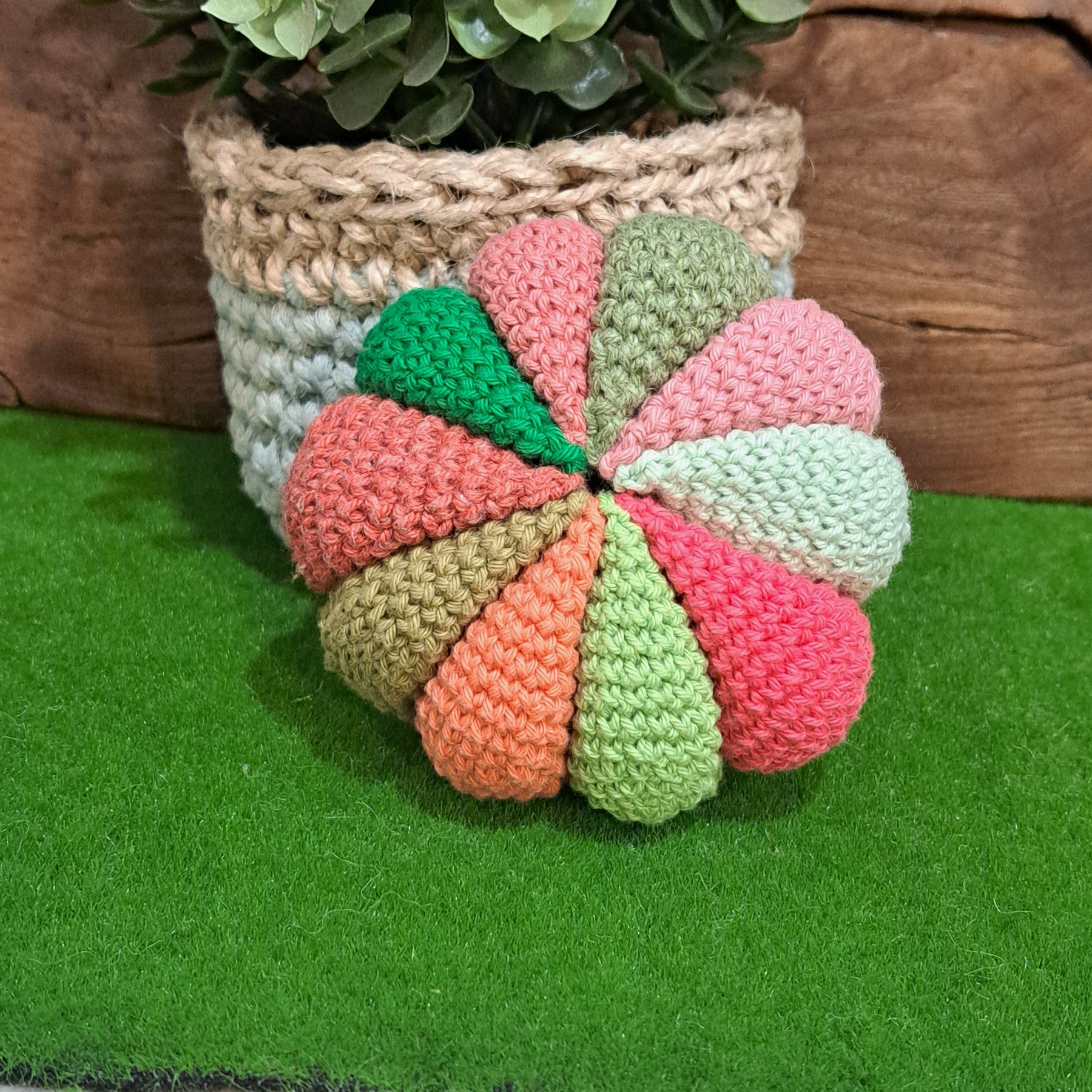 Crochet sensory ball/ with internal rattle/ pink and green colours