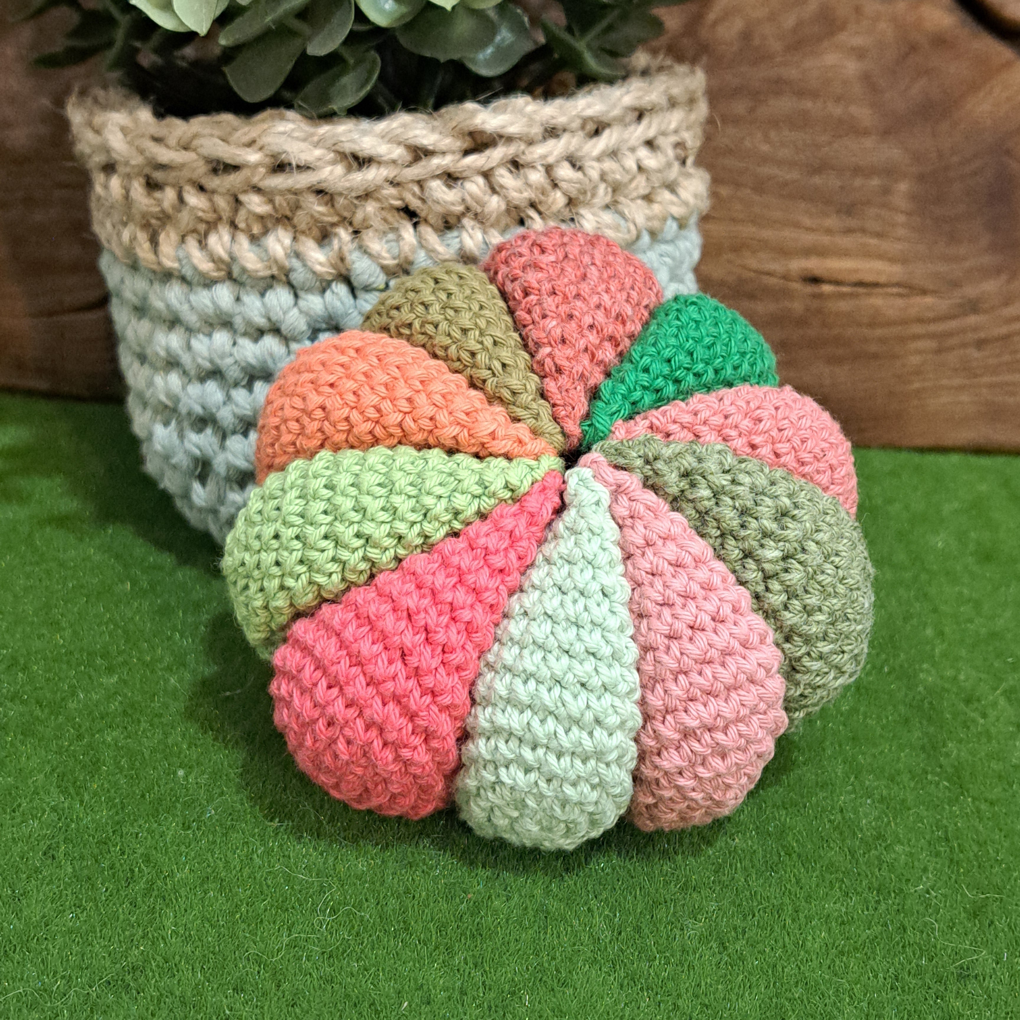 Crochet sensory ball/ with internal rattle/ pink and green colours