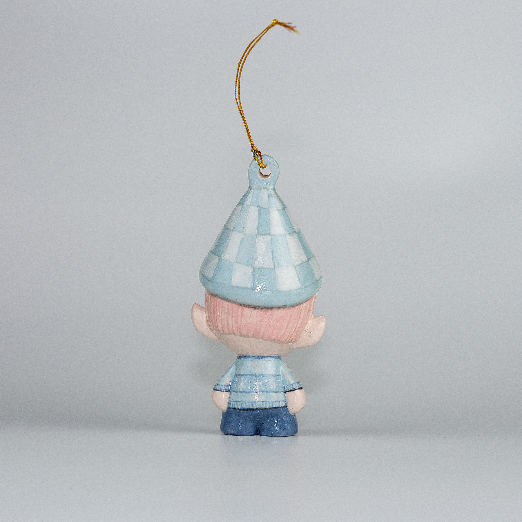 Handmade Porcelain Christmas ornament. One-of-a-kind. Sally, the Christmas Sweater designer Elf.