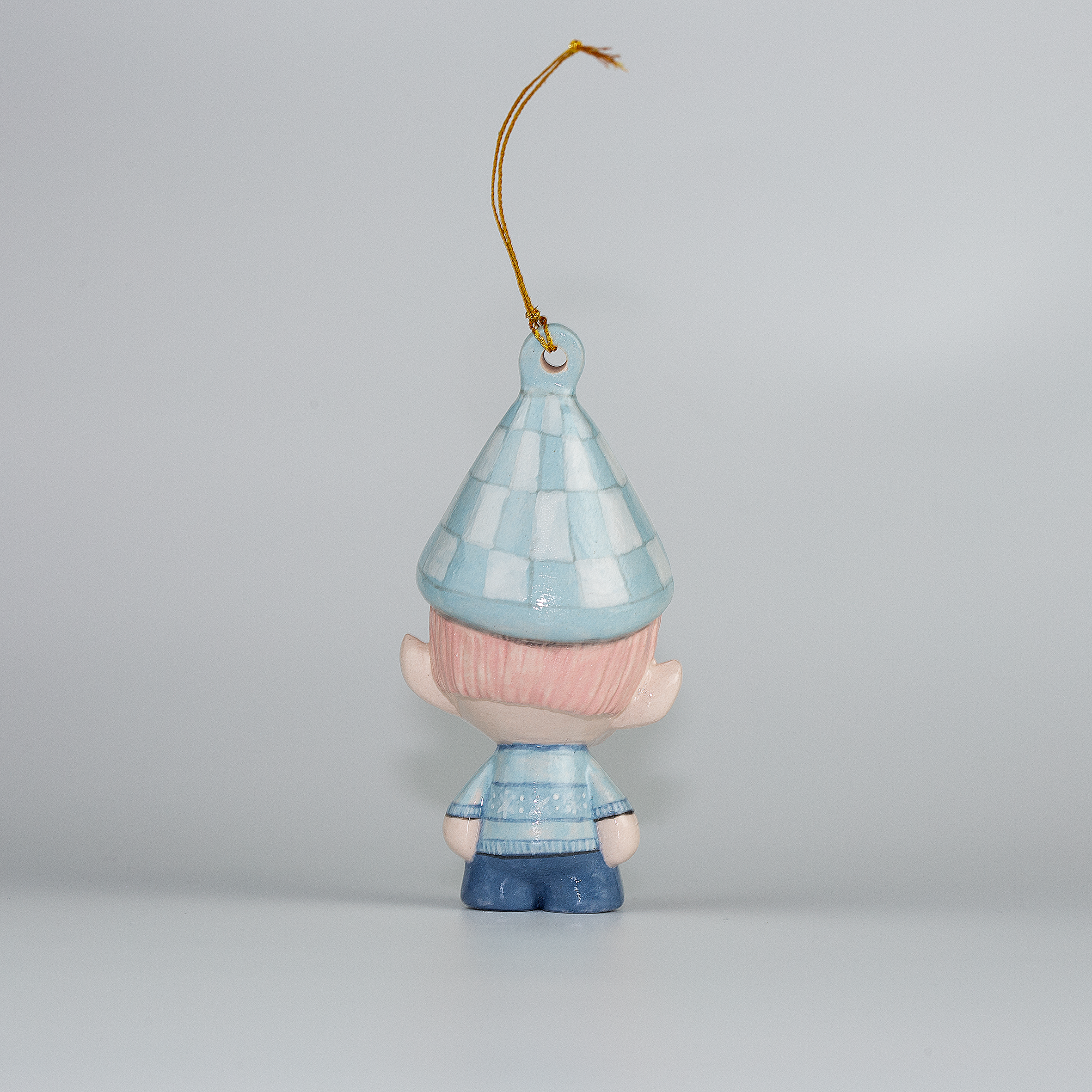 Handmade Porcelain Christmas ornament. One-of-a-kind. Sally, the Christmas Sweater designer Elf.