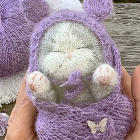 Handmade Grey and White Knitted Sleeping Kitty Toy in The Purple Bunny Hat and Blanket