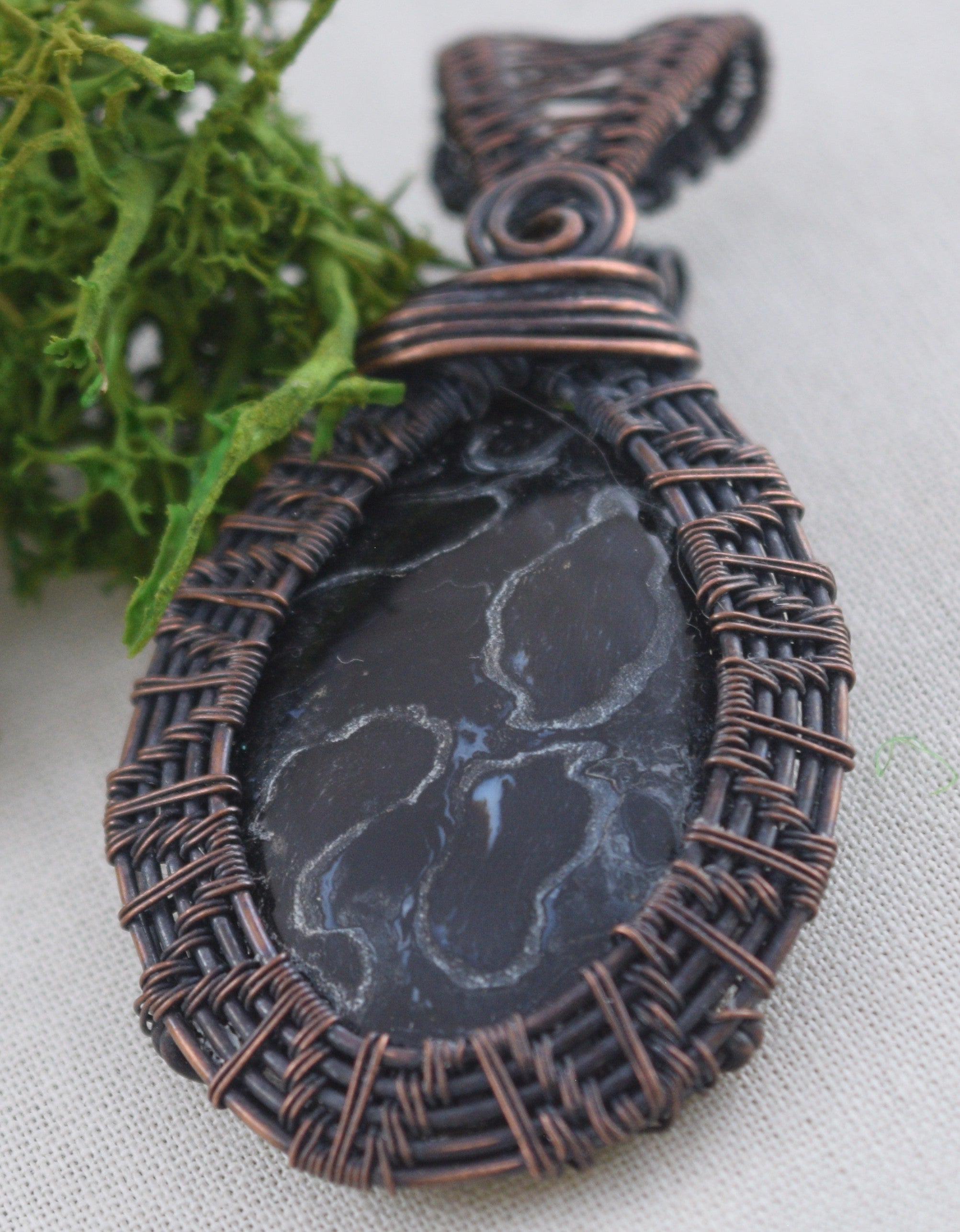 Roots of Age – Handcrafted Palm Root Fossil Copper Pendant