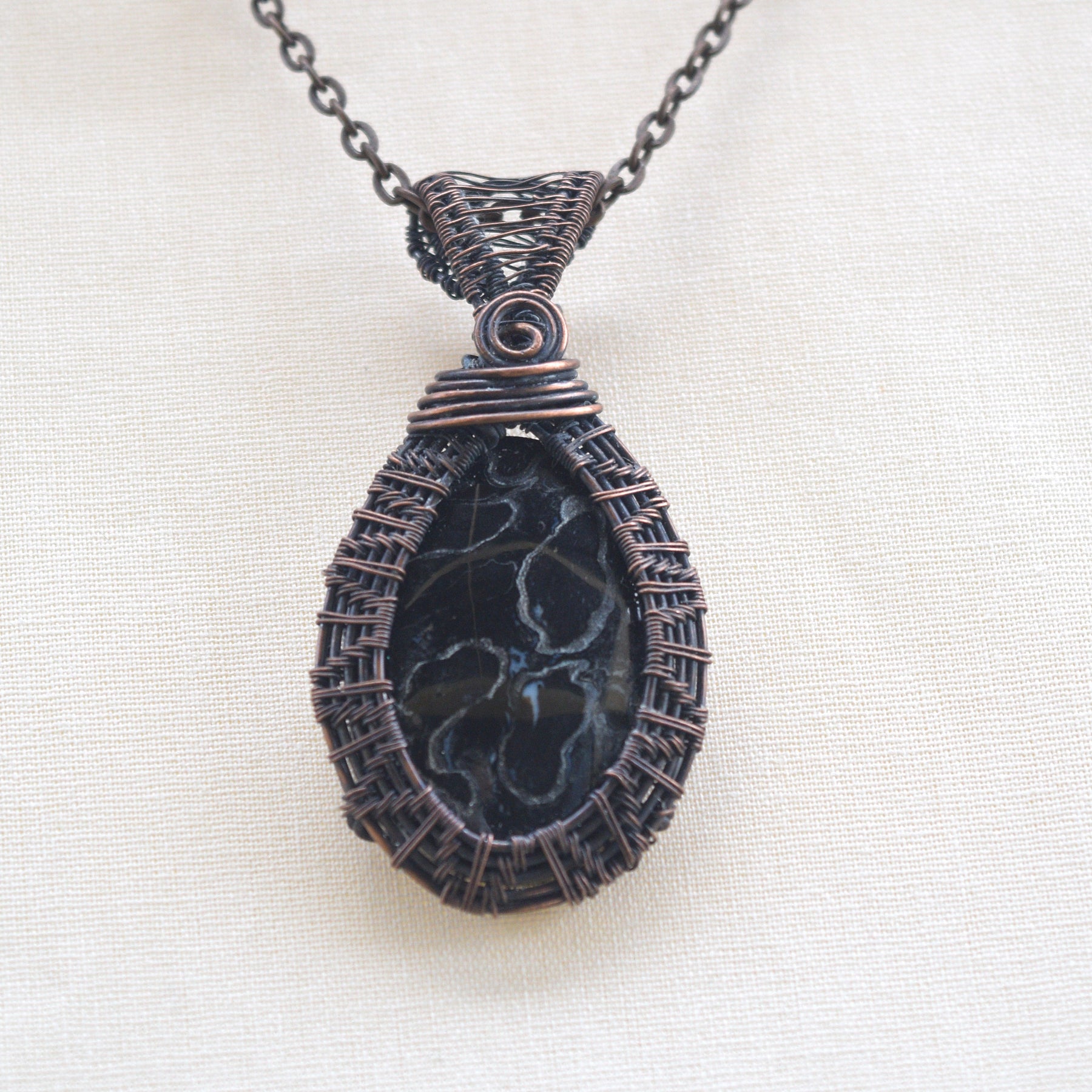 Roots of Age – Palm Root Fossil Wire Wrapped Pendant