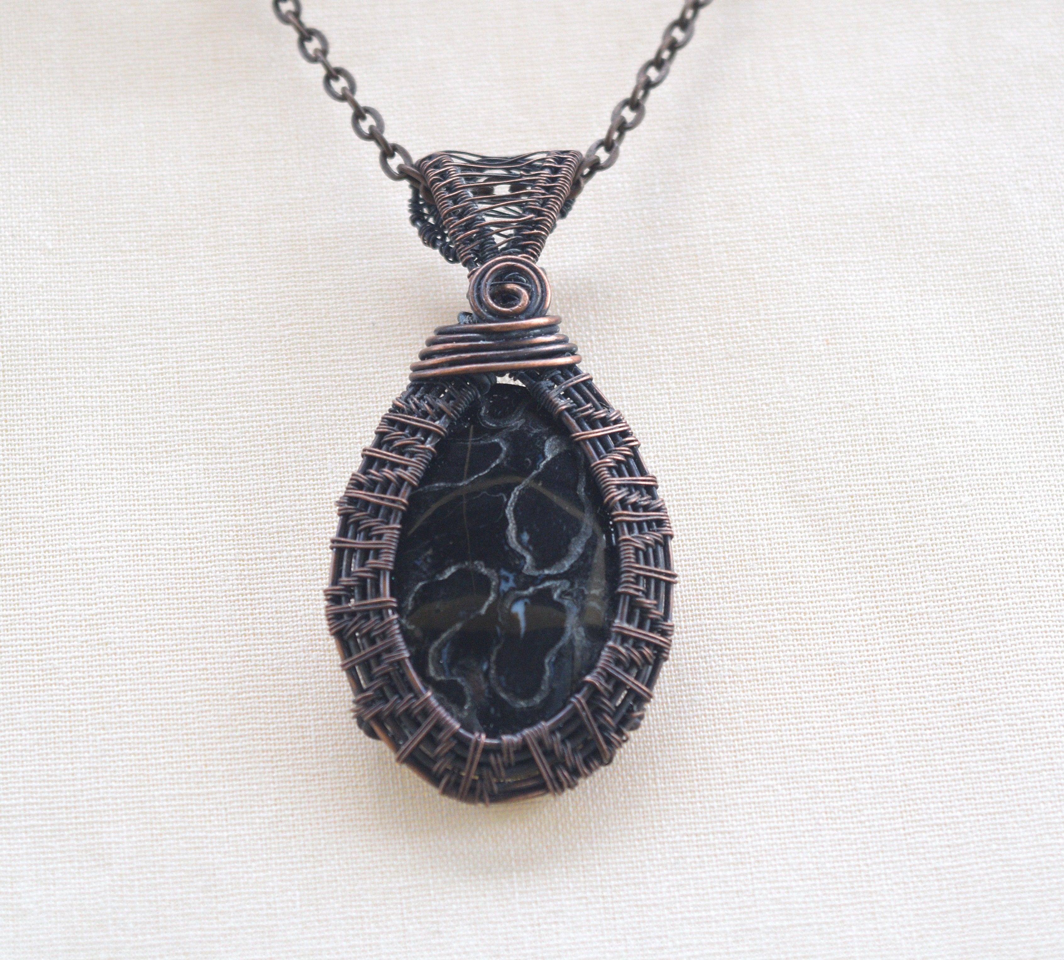 Roots of Age – Handcrafted Palm Root Fossil Copper Pendant