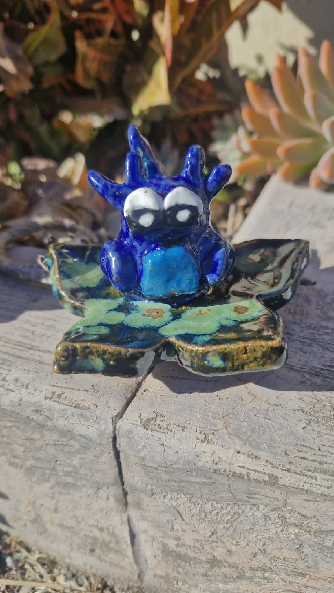 Small Axolotl on Flower Sculpture.