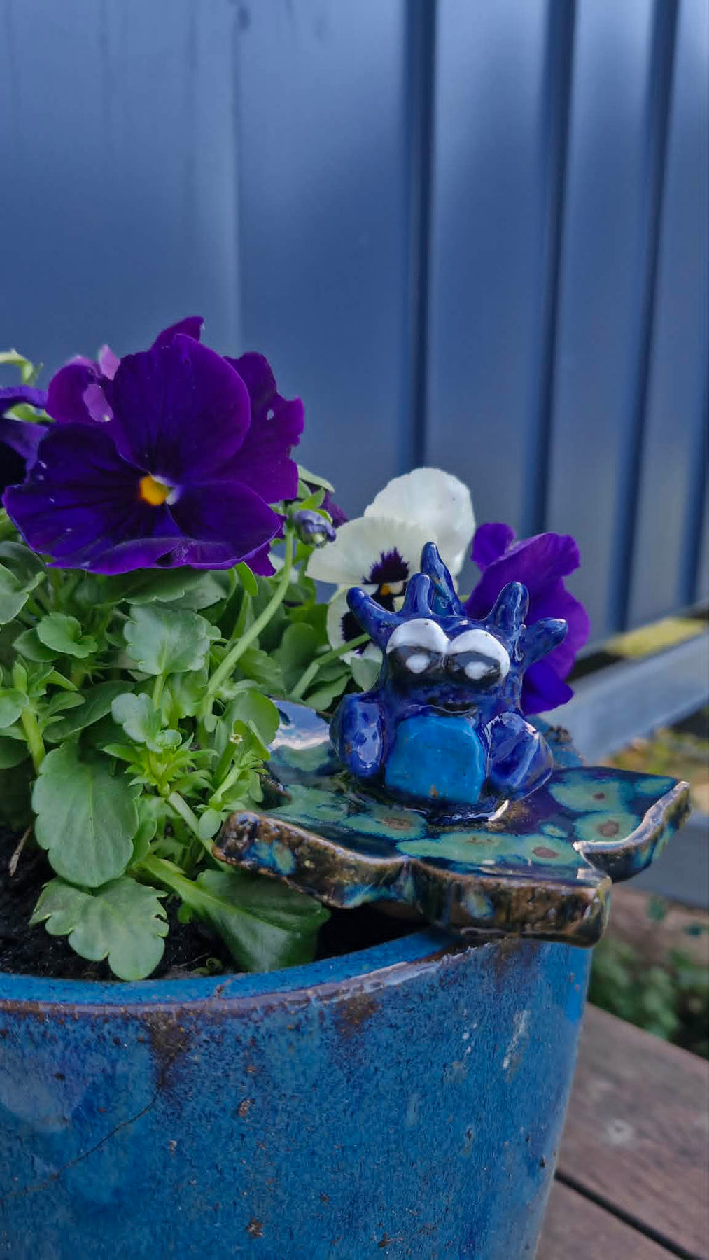 Small Axolotl on Flower Sculpture.