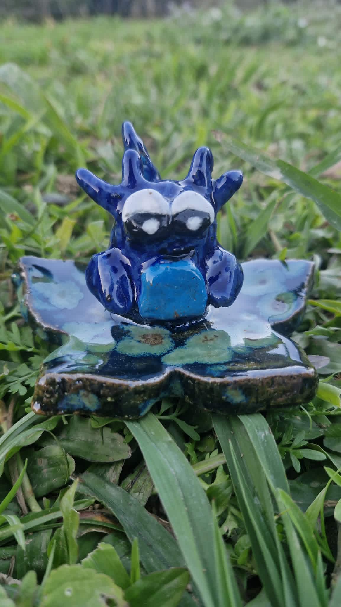Small Axolotl on Flower Sculpture.